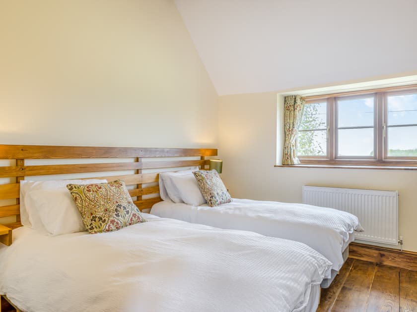 Middle bedroom set up with twin beds | Derwen Deg Fawr, Llanfair Dyffryn, near Llangollen