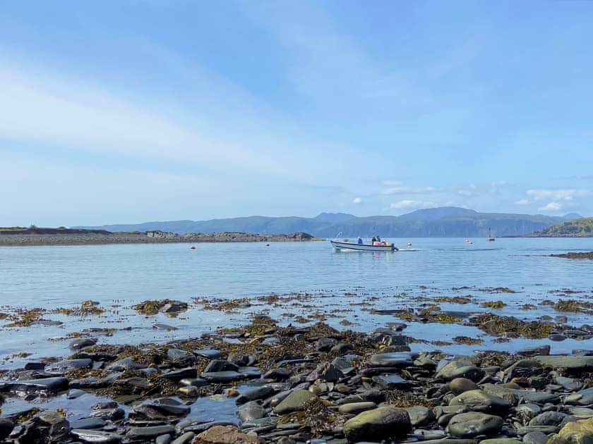 Ferry going over to Easdale Island | Seashell Cottage - Tramway Cottages, Ellenabeich, Isle of Seil