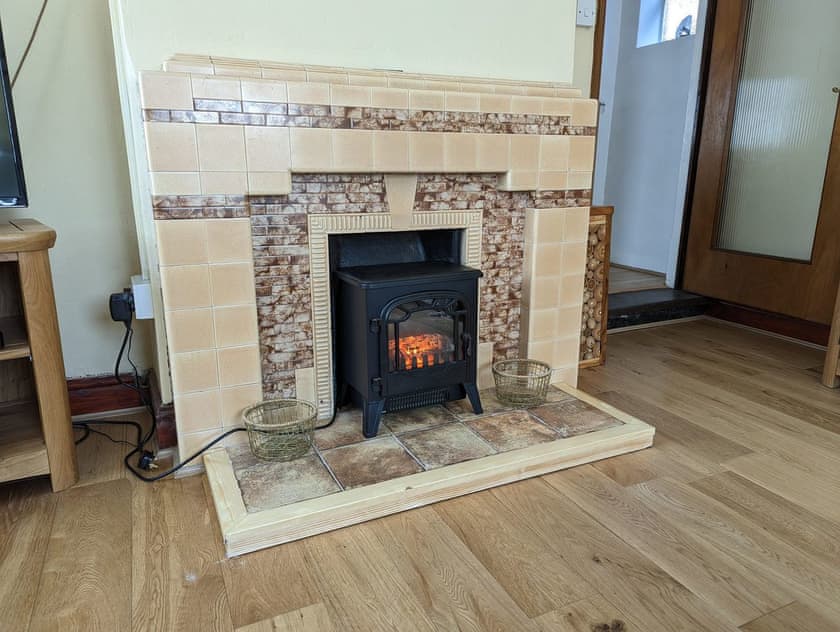 Original 1950s fireplace | Trinity Cottage, Wells-next-the-Sea