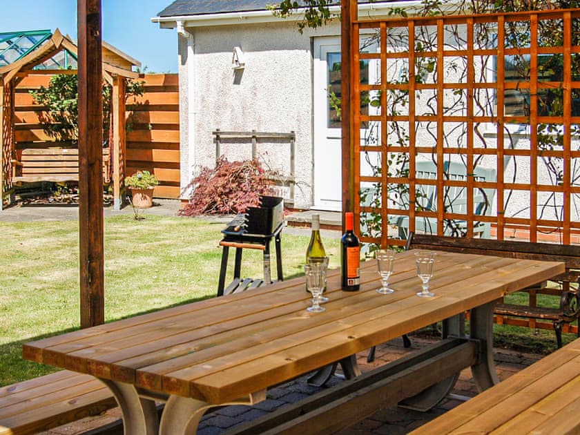Sitting-out-area | Angorfa Family Holiday House, Aberdovey