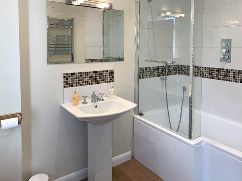 Bathroom with shower over bath | Beach Walk, Paignton