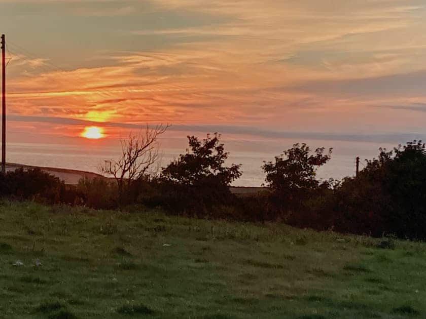 Sunset View from the living area | Caerau Bach, Trefin, near St David’s
