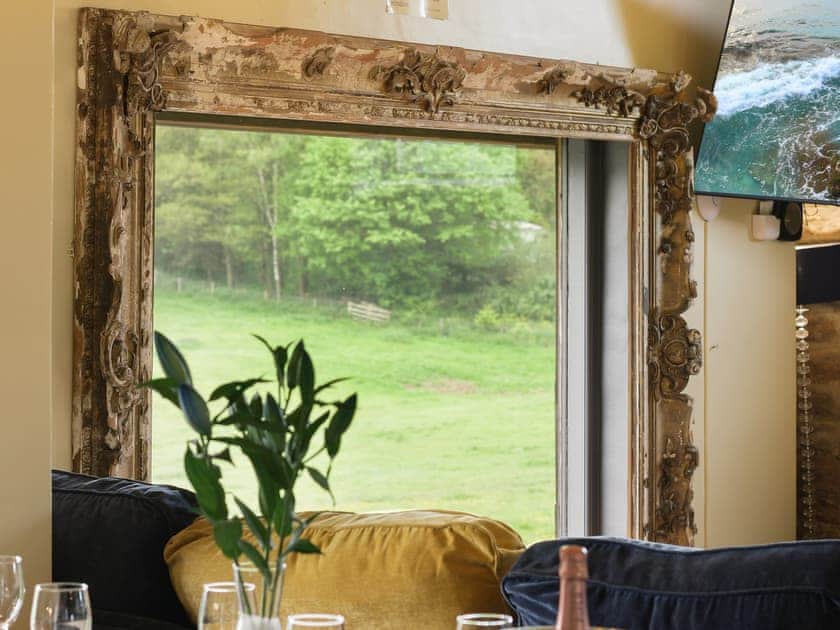 Open plan sitting room with view over the Peak District National park | Harthill Barn - Harthill Hall, Alport, near Bakewell