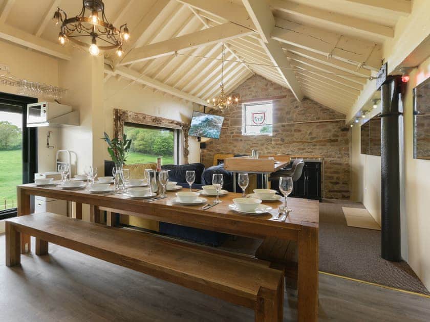 Open plan sitting room with view over the Peak District National park | Harthill Barn - Harthill Hall, Alport, near Bakewell