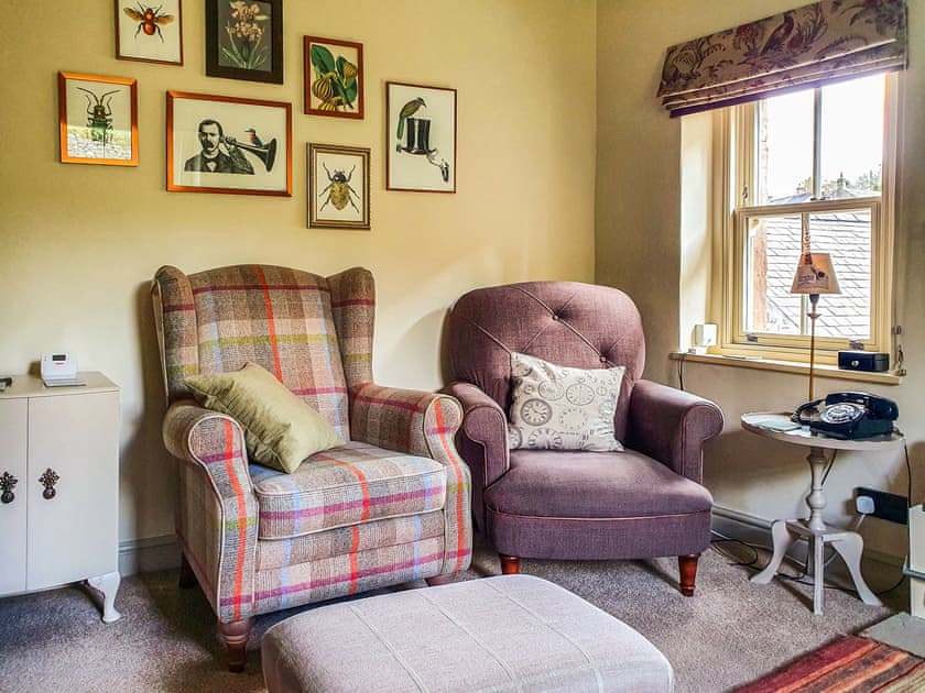 Cosy living room with woodburner | Penny Cottage, Bonsall, near Matlock