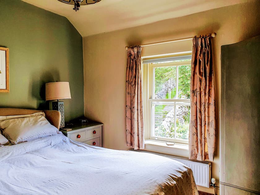 Gorgeous main bedroom with rural views | Penny Cottage, Bonsall, near Matlock