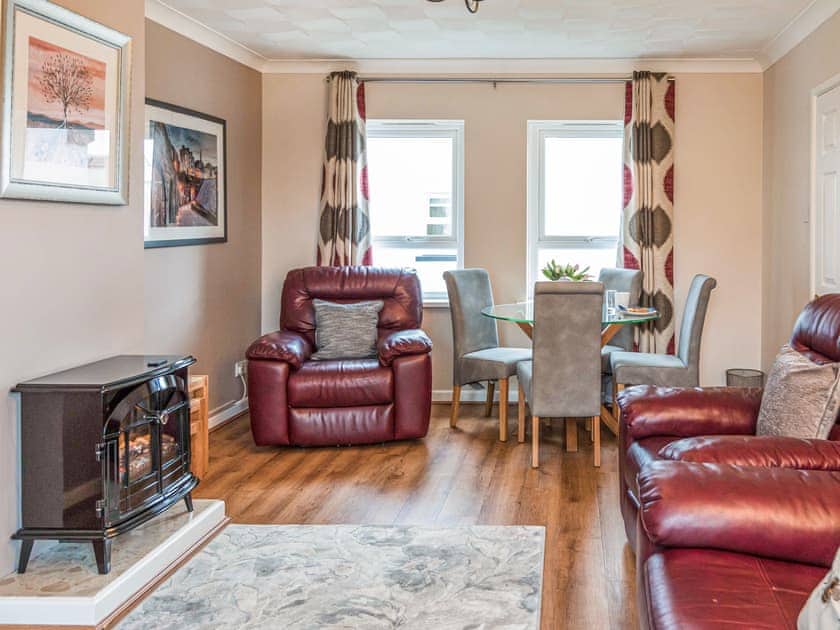 Living area | Bosun’s Cabin - Celtic Haven Resort, Lydstep, near Tenby
