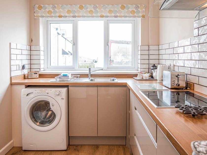 Kitchen | Bosun’s Cabin - Celtic Haven Resort, Lydstep, near Tenby