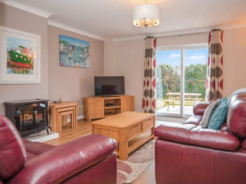 Living room | Puffin Cottage - Celtic Haven Resort, Lydstep, near Tenby