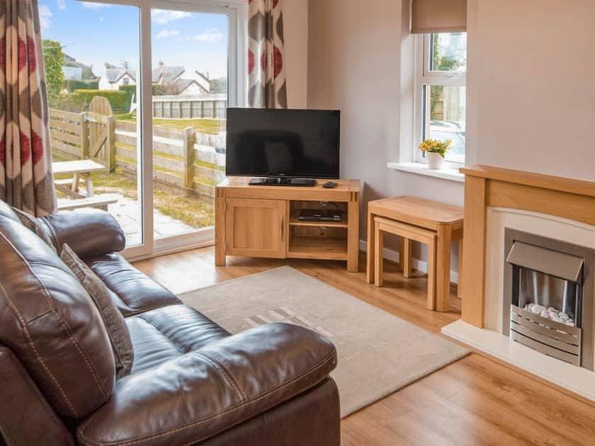 Living room | Gatekeepers Cottage - Celtic Haven Resort, Lydstep, near Tenby