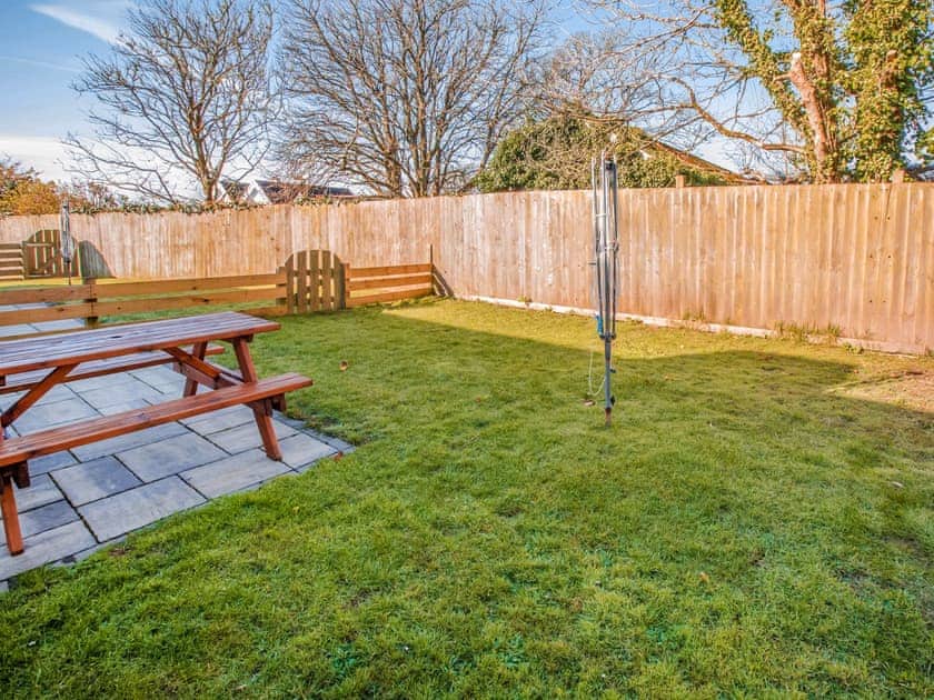 Garden | Gatekeepers Cottage - Celtic Haven Resort, Lydstep, near Tenby
