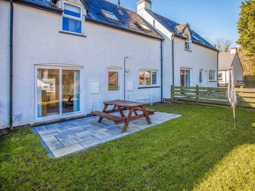 Garden | Dolphin Cottage - Celtic Haven Resort, Lydstep, near Tenby