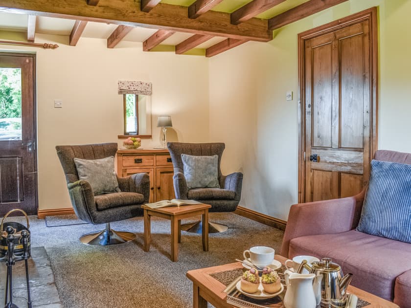 Comfy seating in living room | Ladycroft Cottage, Hebden, near Skipton