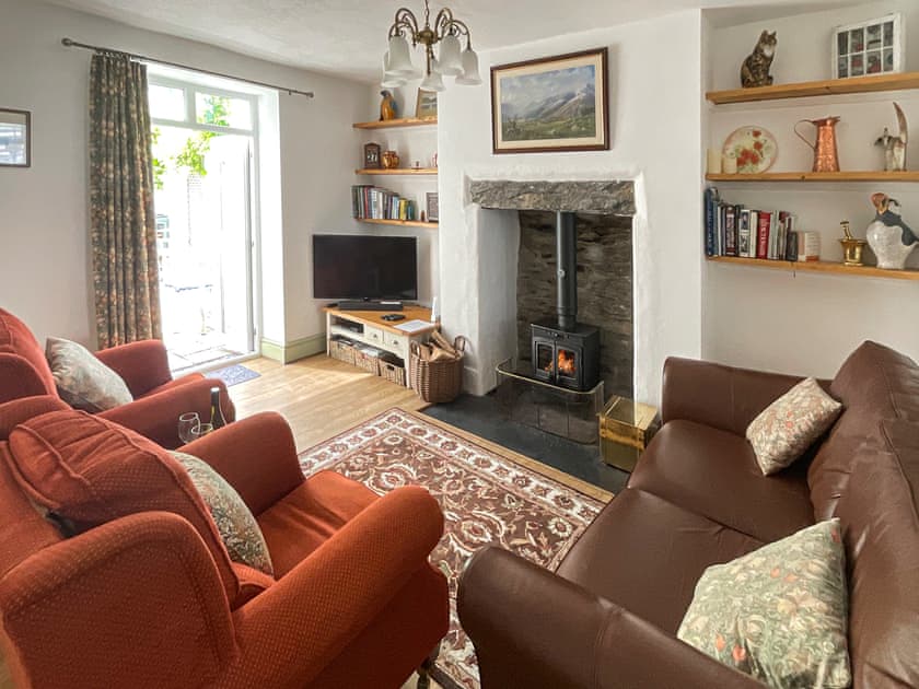 Comfortable living room with open fireplace | Llys Deulyn, Trefriw, near Betws-y-Coed