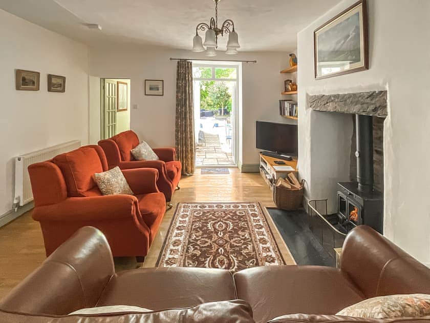 Living room with patio doors to the garden | Llys Deulyn, Trefriw, near Betws-y-Coed