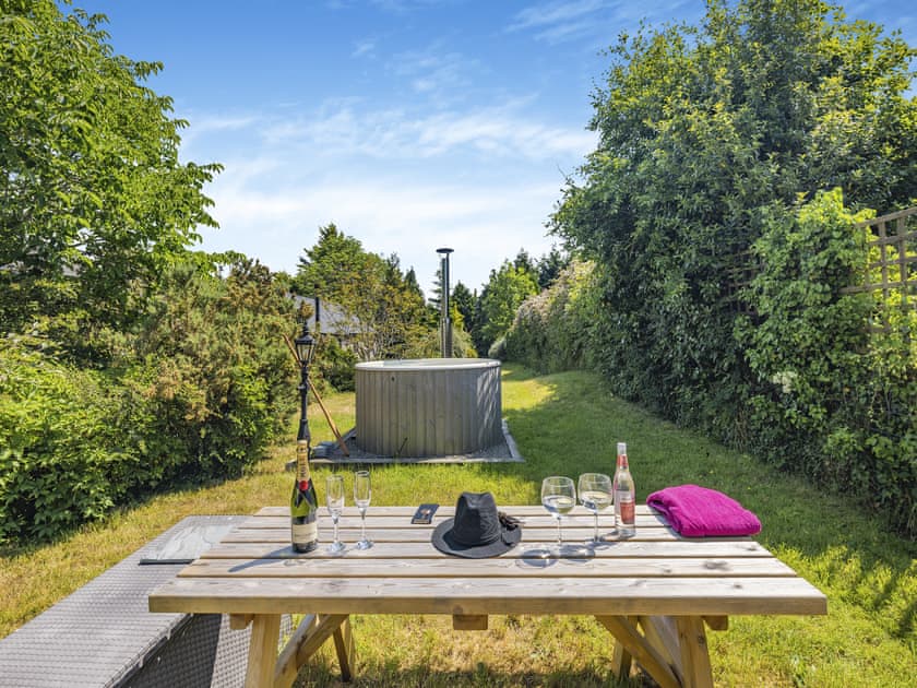 Cottages hot tub and sitting-out-area  | Bluebell Cottage - Pen y Bryn Farm and Holiday Cottages, Betws Yn Rhos