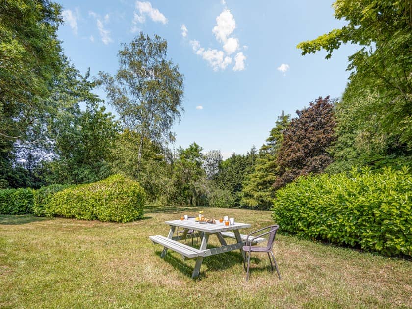 Sitting-out-area | The Farmhouse - Pen y Bryn Farm and Holiday Cottages, Betws Yn Rhos
