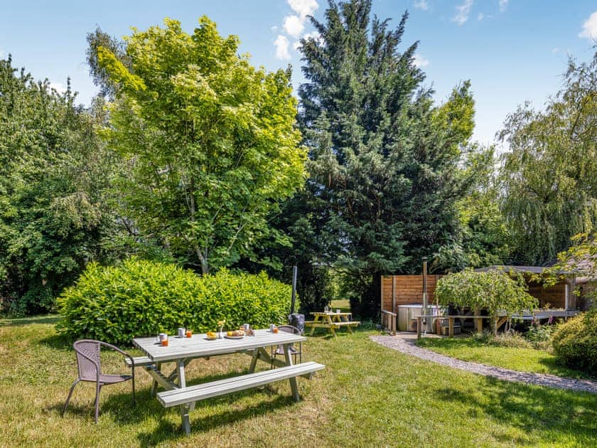 Sitting-out-area | The Farmhouse - Pen y Bryn Farm and Holiday Cottages, Betws Yn Rhos