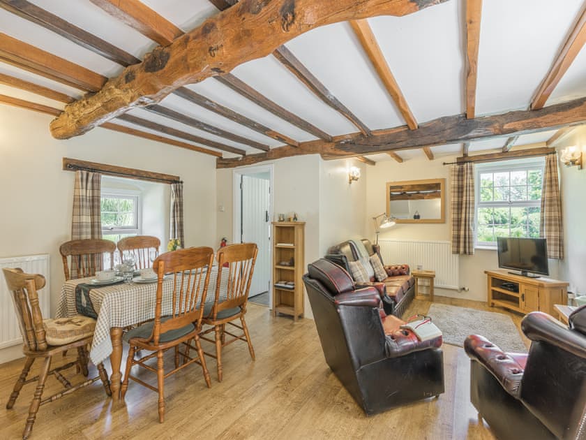 Living room/dining room | Primrose Cottage - Pen y Bryn Farm and Holiday Cottages, Betws Yn Rhos