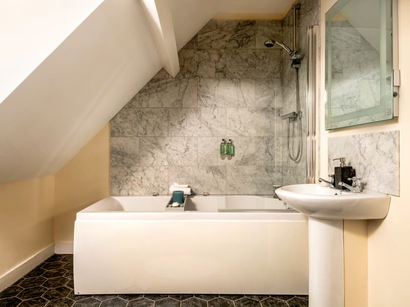 Bathroom with shower over bath | Upper Wing - Gresham Hall Estate, Gresham, near Sheringham