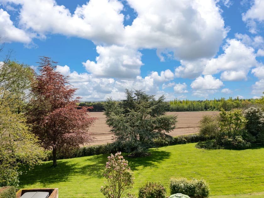 Lovely view over the garden | Upper Wing - Gresham Hall Estate, Gresham, near Sheringham
