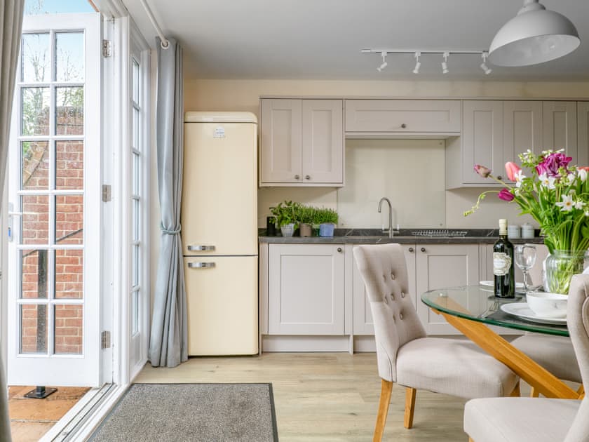 Elegant dining area within kitchen | Ground Wing - Gresham Hall Estate, Gresham, near Sheringham
