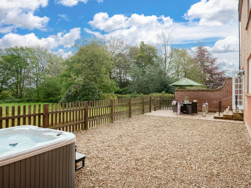 Enclosed patio area with hot tub | Ground Wing - Gresham Hall Estate, Gresham, near Sheringham