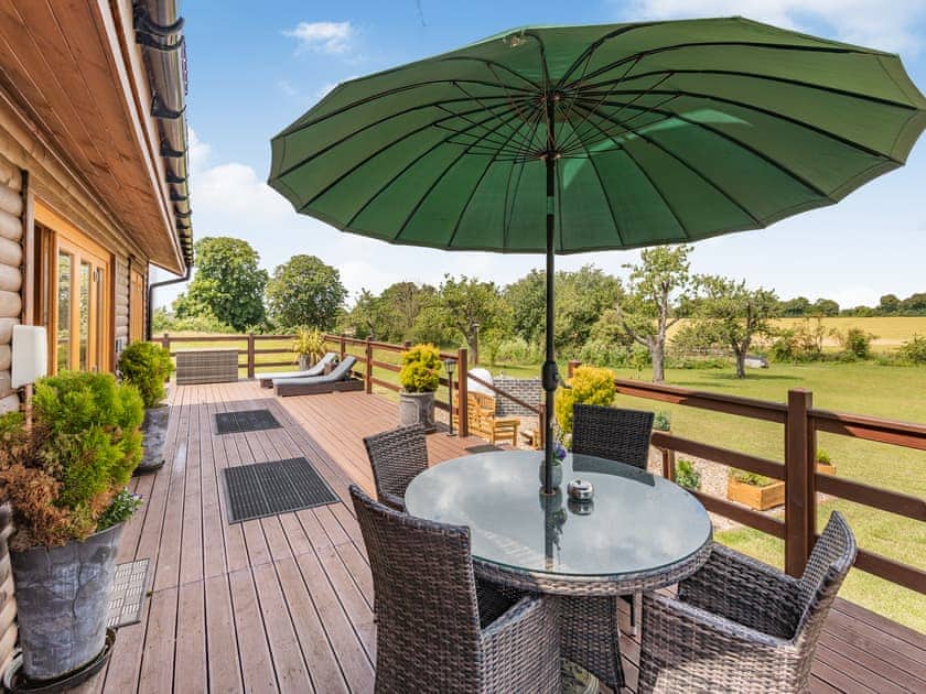 Sitting-out-area | Bramble Lodge - The Orchard Luxury Lodges, Hadleigh