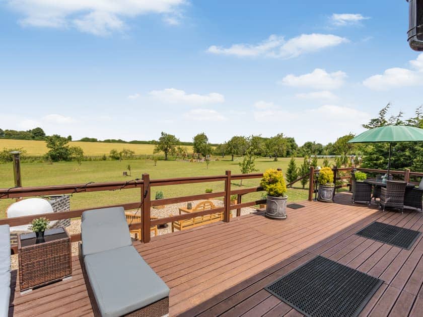 Sitting-out-area | Bramble Lodge - The Orchard Luxury Lodges, Hadleigh