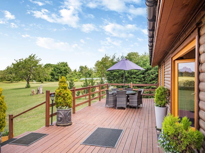 Sitting-out-area | Honeysuckle Lodge - The Orchard Luxury Lodges, Hadleigh