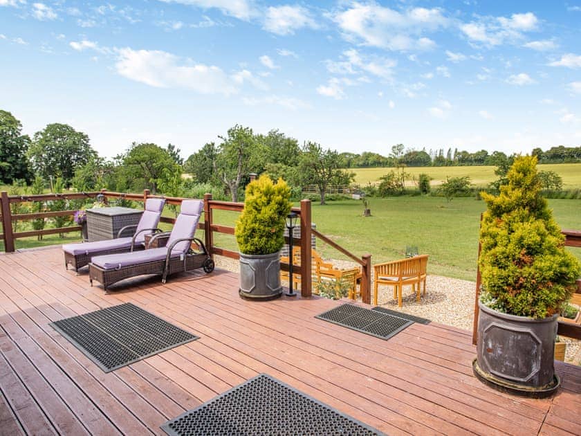 Sitting-out-area | Honeysuckle Lodge - The Orchard Luxury Lodges, Hadleigh