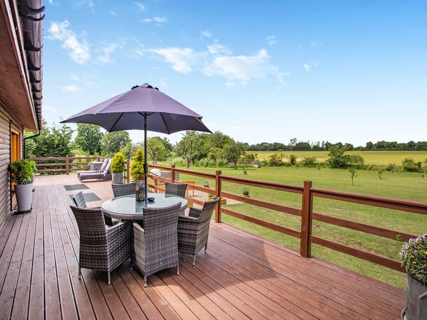 Sitting-out-area | Honeysuckle Lodge - The Orchard Luxury Lodges, Hadleigh