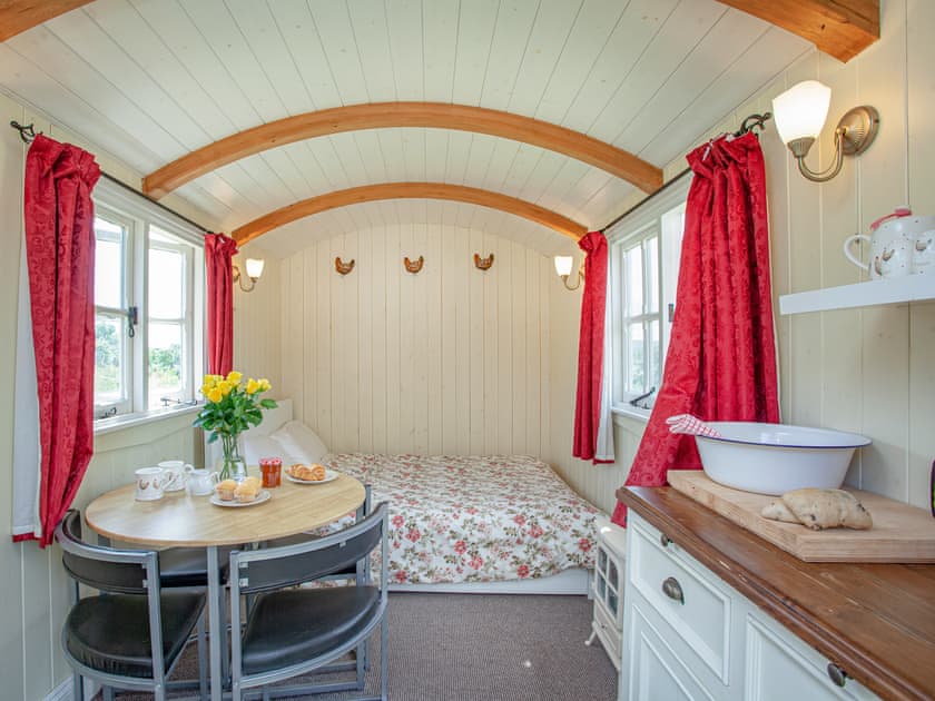 Living area | Shepherd’s Hut - East Hill Pride Farm, Harpford, near Sidmouth