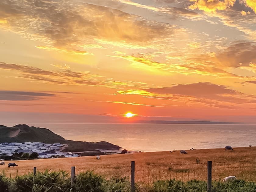 Sunset view from rear garden  | Ceiliog Bach, Llangennith, near Swansea