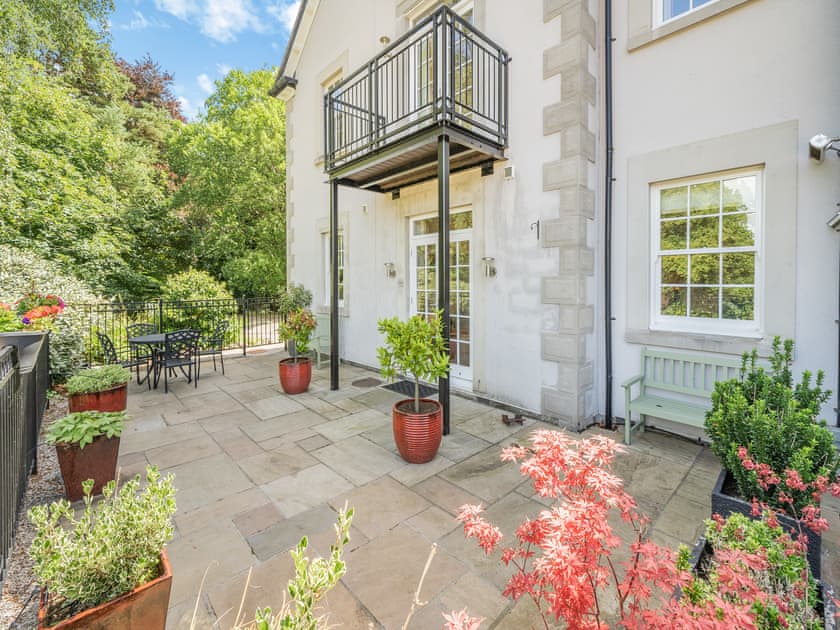 Relaxing patio with garden furniture  | Apartment 14, Silverdale, near Arnside