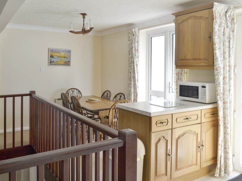 Open-plan living area includes dining and kitchen spaces | Smugglers Haunt - Anchor Cottages, Hope Cove, near Kingsbridge