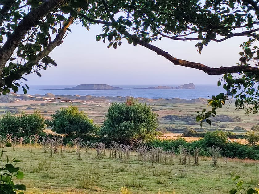 View of Worms Head from the front garden  | Ceiliog Bach, Llangennith, near Swansea