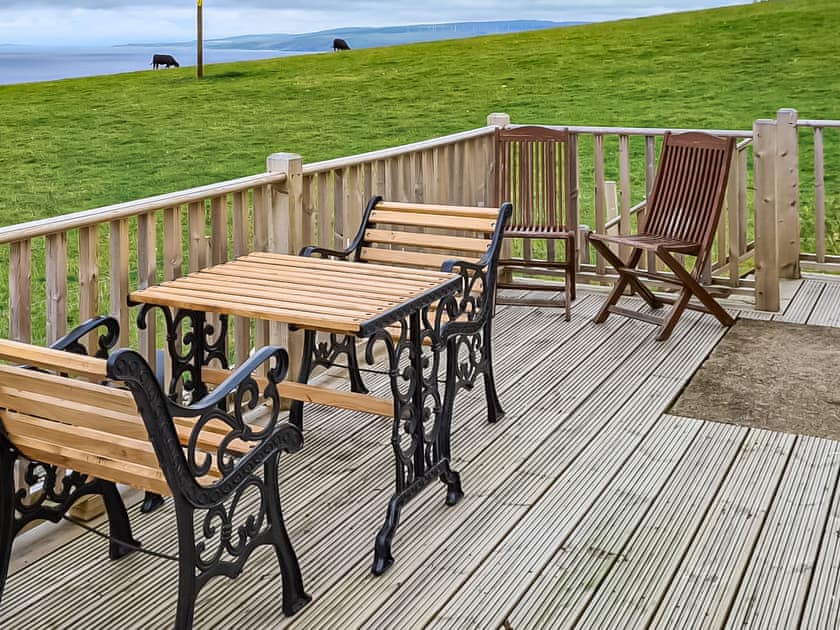 Decking area with bbq area below | Ballygroggan Bungalow - Ballygroggan Farm, Machrihanish, near Campbeltown