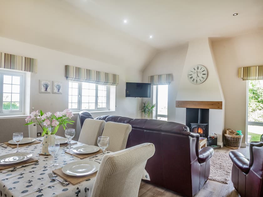 Open plan living space | Bryn Awelon Y Bwthyn - Moelfre Cottages, Moelfre, near Benllech
