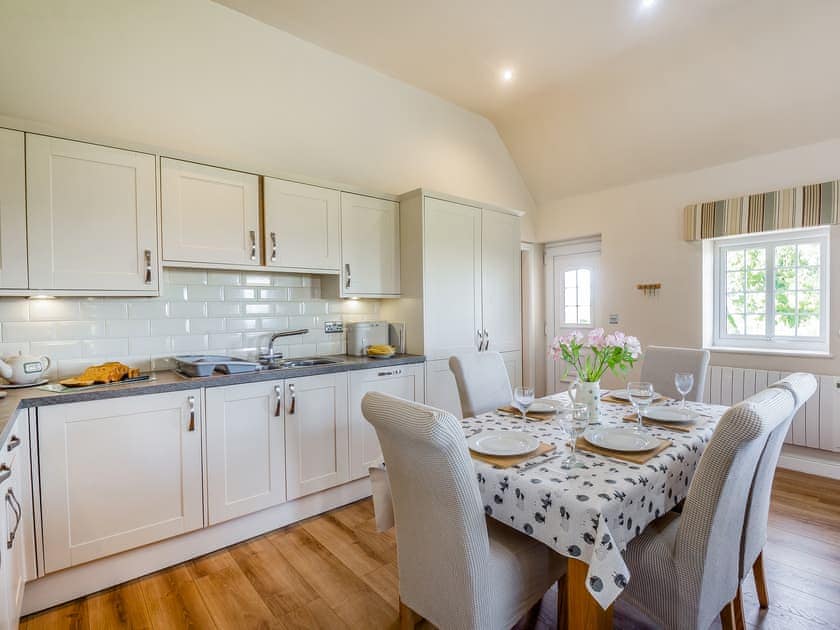 Kitchen/diner | Bryn Awelon Y Bwthyn - Moelfre Cottages, Moelfre, near Benllech