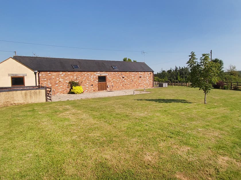 Garden surrounded by lush countryside | Blackberry Barn - Middle Huntingford Barns, Charfield, near Wotton-under-Edge