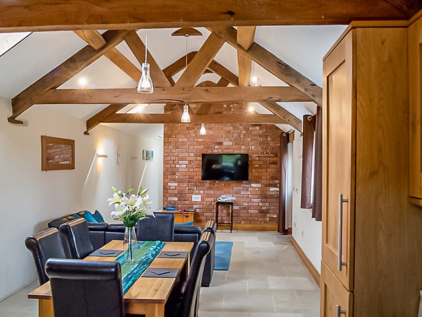 Dining area in open-plan living room | Bramble Barn - Middle Huntingford Barns, Charfield, near Wotton-under-Edge