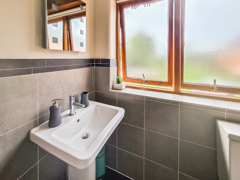 Family bathroom with shower over bath | Bramble Barn - Middle Huntingford Barns, Charfield, near Wotton-under-Edge