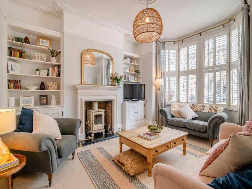 Living Room with cosy wood burner | Pierside Coastal Retreat, Clevedon