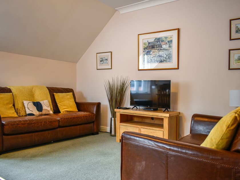 Lounge area with TV | Bosun’s Quarters, Whitby