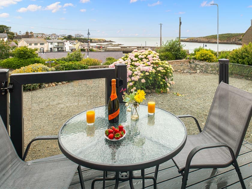 Private decking and enclosed front garden  | Harbour View, Cemaes Bay