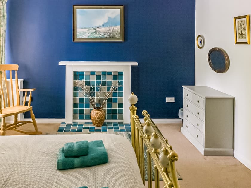 Charming double bedroom with feature fireplace | The Rockery - Rockery Cottages, Shap, near Penrith