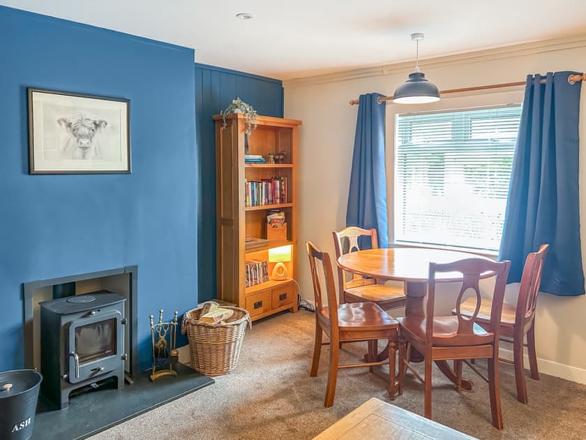Living and dining area with wood burner | Broom Cottage, Newtonmore
