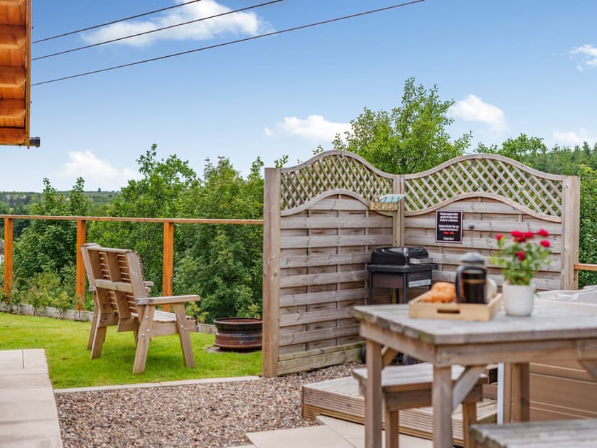 Sitting-out-area | Lochinvar Clydesdale Cabin - Lochinvar Lets, Plains, near Airdrie