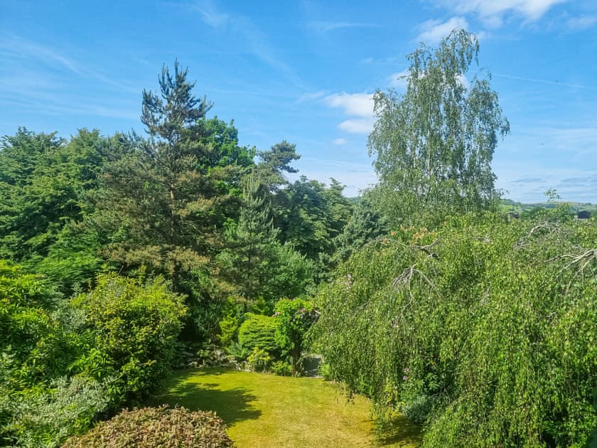 View of the garden from the balcony  | Harwood Dale Cottage, Kendal